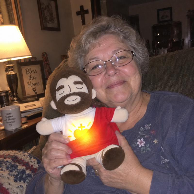 Customer photo with the Jesus plush